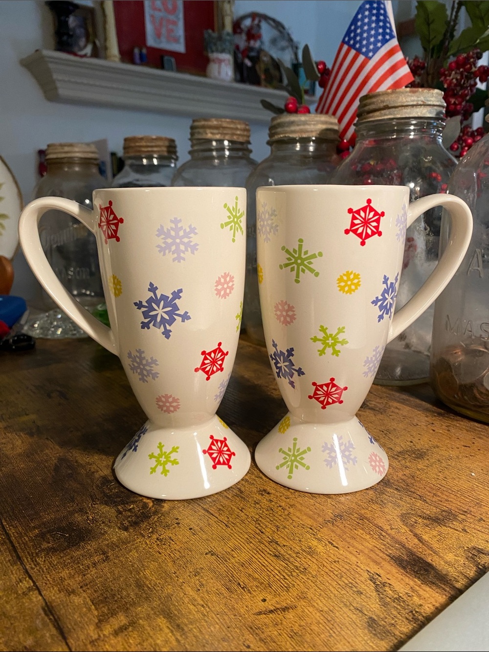 White Ceramic Pedestal Mugs with Multicolor Snowflake Pattern